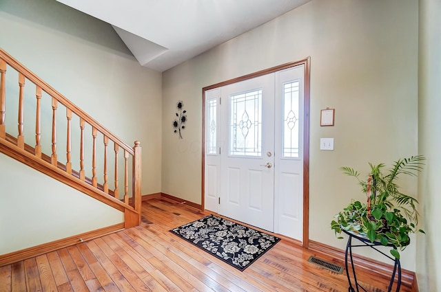 entrance foyer with light wood-type flooring