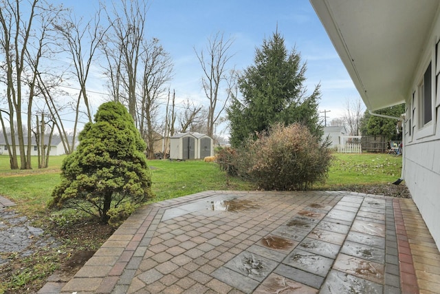 view of patio featuring a shed