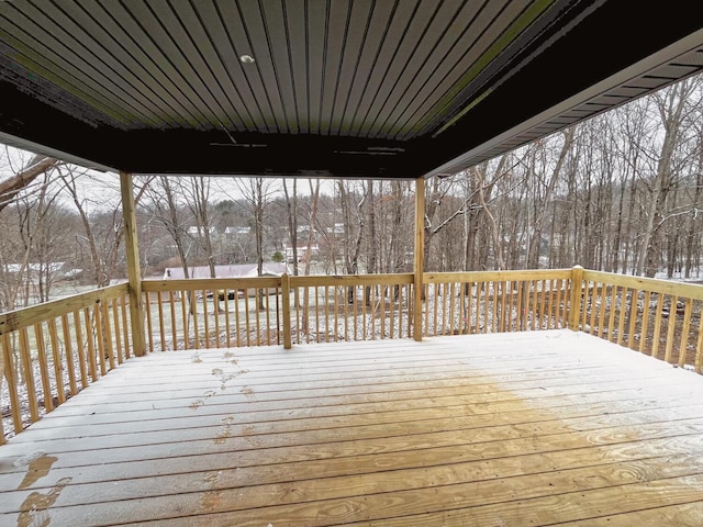 view of snow covered deck