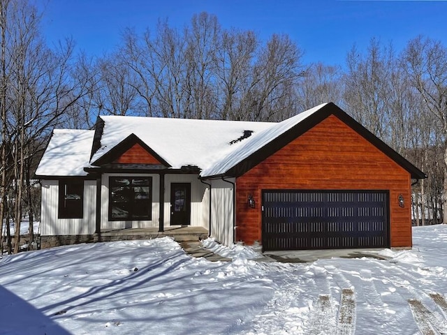 view of front of property with a garage