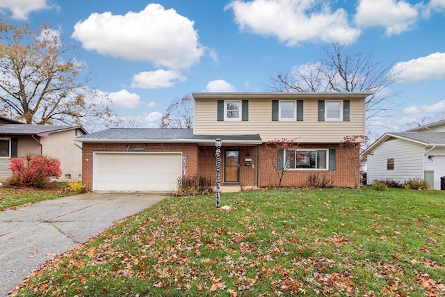 front of property featuring a garage and a front lawn