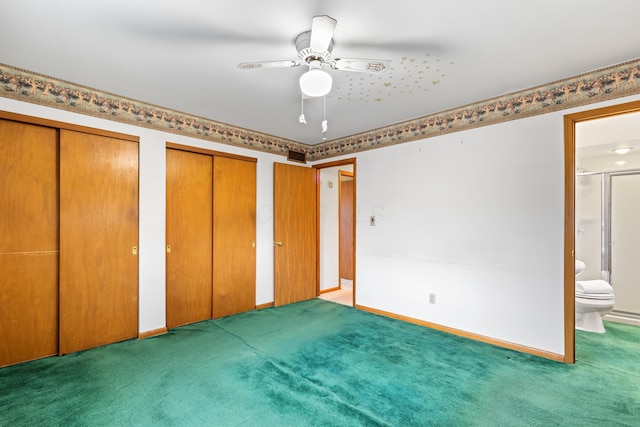 unfurnished bedroom featuring ensuite bath, ceiling fan, and carpet floors