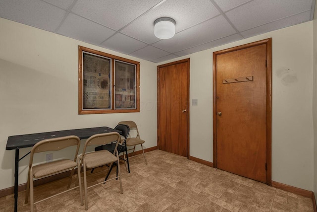 interior space featuring a paneled ceiling