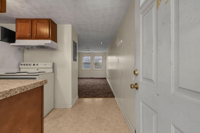 kitchen with white electric range, a textured ceiling, and electric panel