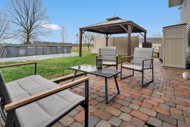 view of patio with a gazebo and an outdoor hangout area