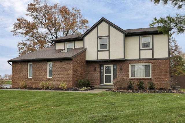 tudor-style house with a front lawn