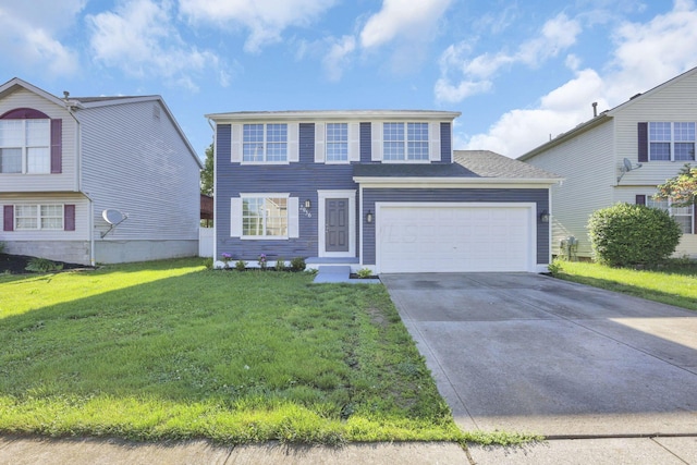 view of front of property featuring a garage and a front lawn