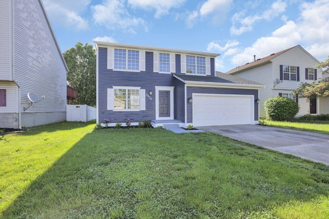 view of front of house featuring a garage and a front lawn