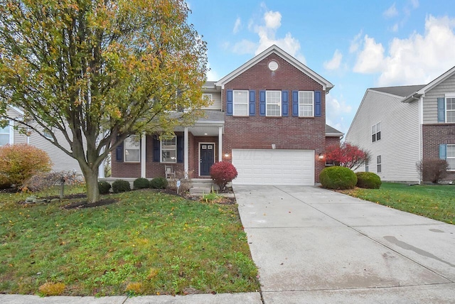 view of property with a front yard and a garage