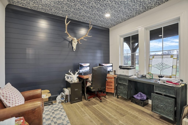 office space featuring wooden walls