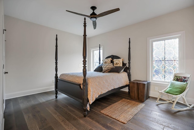 bedroom featuring ceiling fan and dark hardwood / wood-style flooring