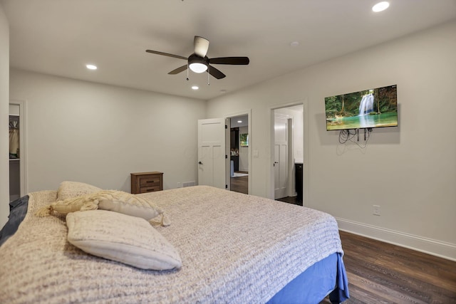 bedroom featuring ceiling fan and dark hardwood / wood-style flooring