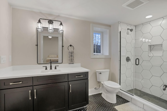 bathroom featuring tile patterned flooring, toilet, vanity, and walk in shower