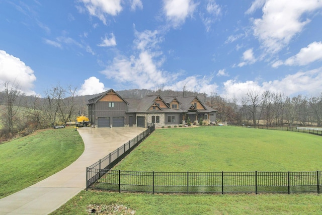 view of front facade featuring a garage and a front yard