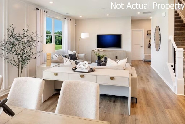 living room featuring light hardwood / wood-style floors