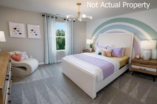 bedroom featuring dark colored carpet and a notable chandelier