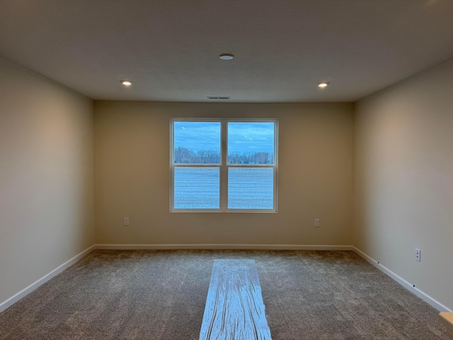 view of carpeted spare room