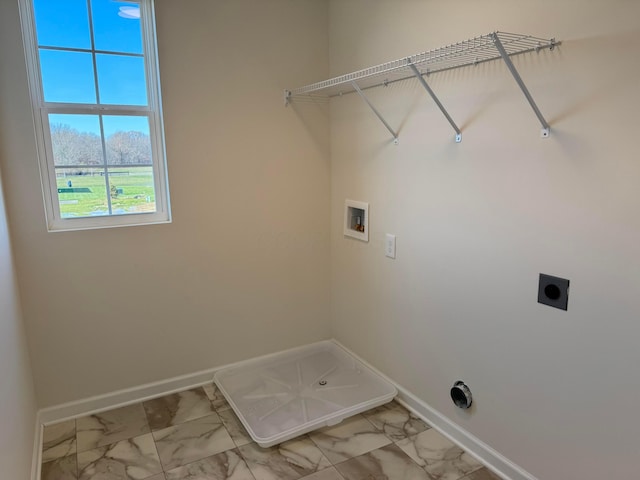 laundry room featuring hookup for an electric dryer and washer hookup