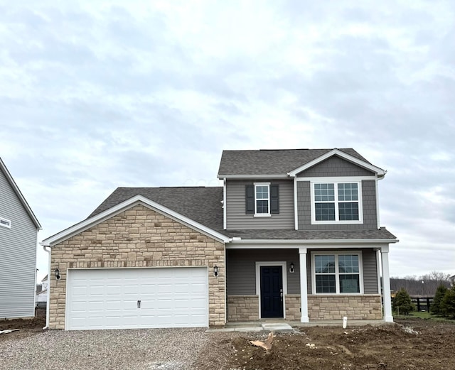 view of front of property featuring a garage