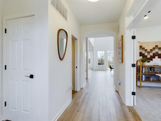 corridor featuring light wood-type flooring