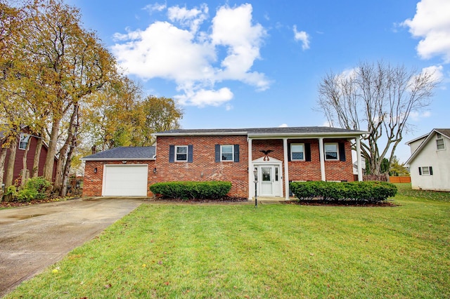 view of front facade featuring a front lawn and a garage