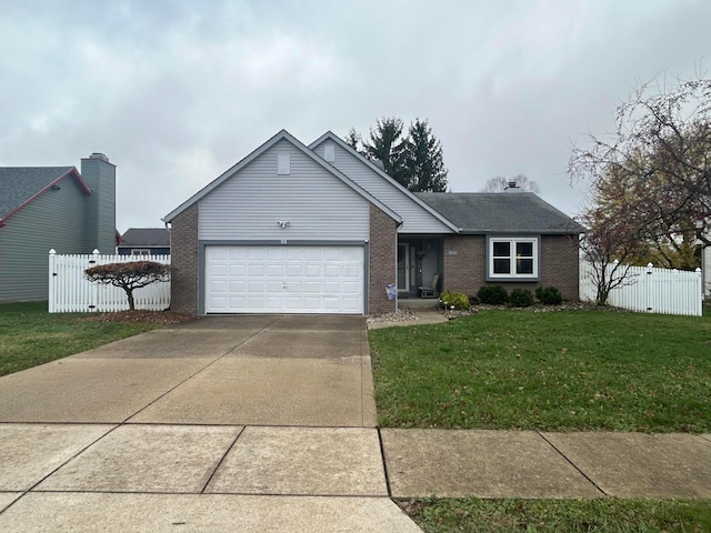 single story home featuring a front lawn and a garage