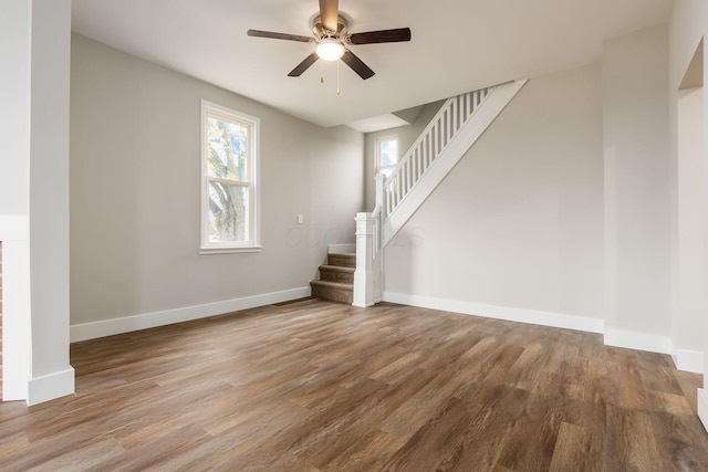 unfurnished living room with hardwood / wood-style floors and ceiling fan