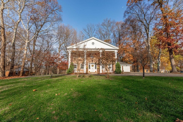 exterior space featuring a front yard