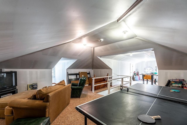 game room featuring carpet flooring and vaulted ceiling with beams