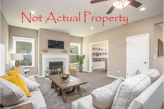 living room with carpet and ceiling fan