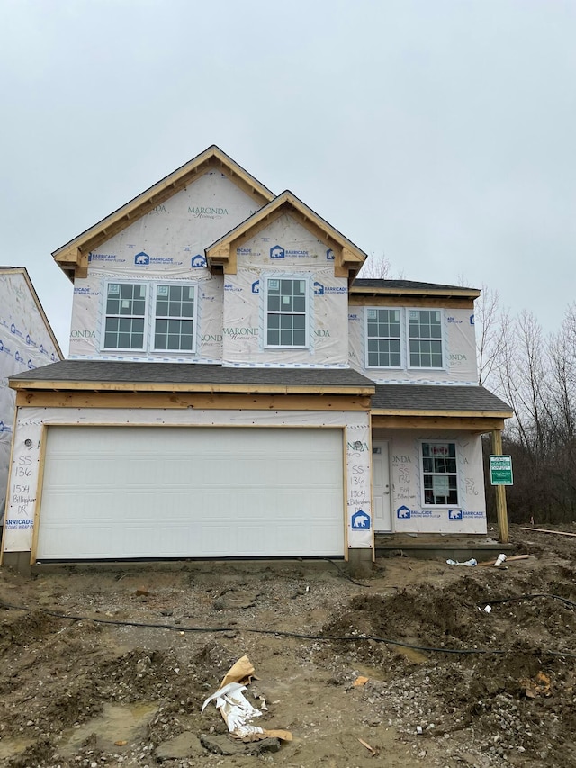 property in mid-construction featuring a garage