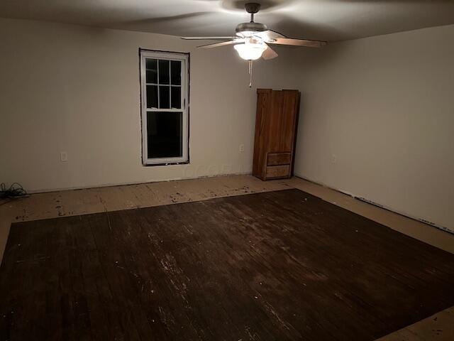 empty room with hardwood / wood-style flooring and ceiling fan