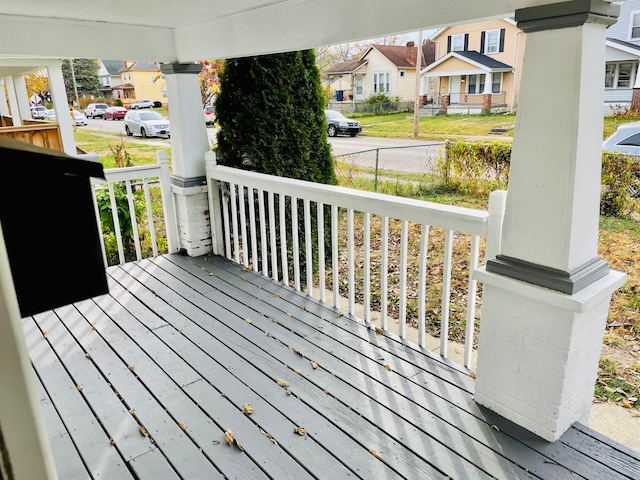 wooden terrace featuring a porch