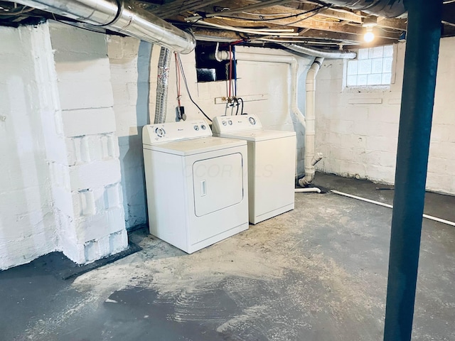 basement with washer and clothes dryer