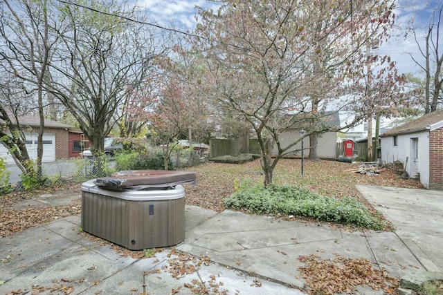 view of patio / terrace featuring a hot tub