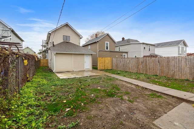 back of property featuring a patio area