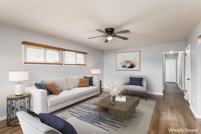 living room with hardwood / wood-style floors and ceiling fan