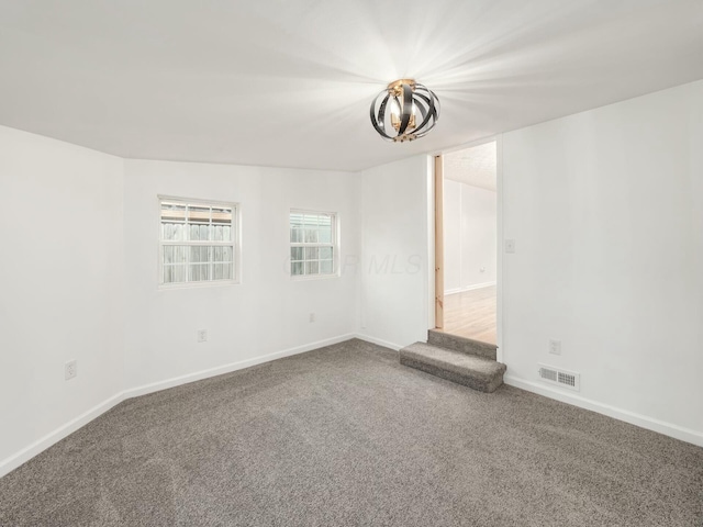 5006 Old Tree Ave, Columbus, OH 43228 - carpeted empty room featuring a chandelier and baseboards