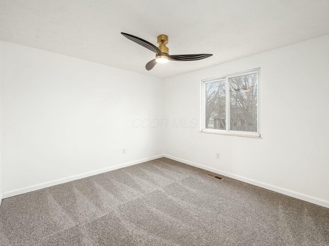 5006 Old Tree Ave, Columbus, OH 43228 - carpeted spare room featuring baseboards and ceiling fan
