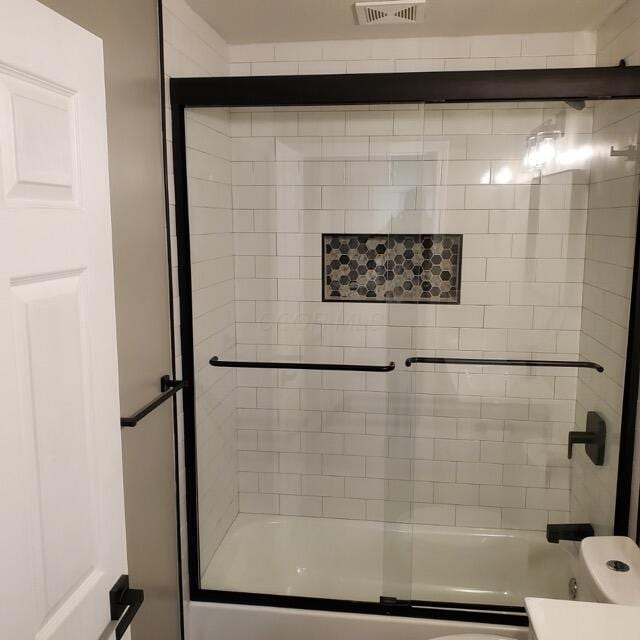 1794 Devonshire Rd, Columbus, OH 43219 - full bath featuring shower / bath combination with glass door