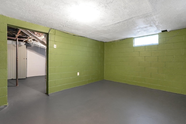 basement with a textured ceiling