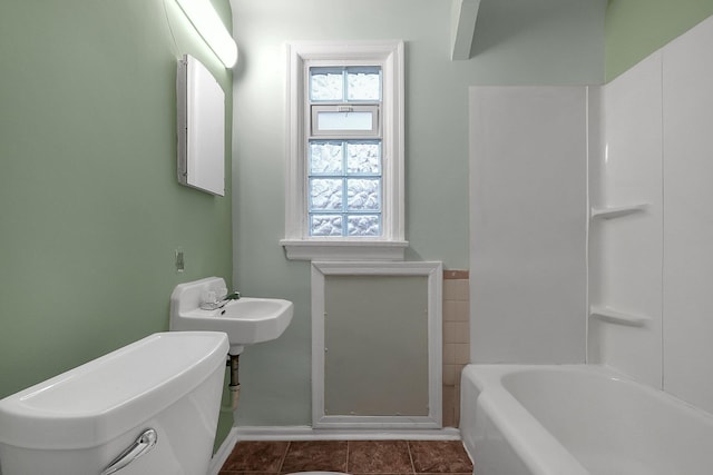 bathroom with tile patterned floors