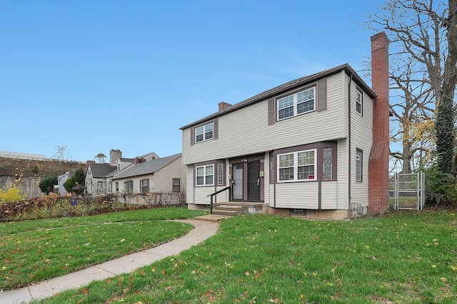 view of front of home with a front yard