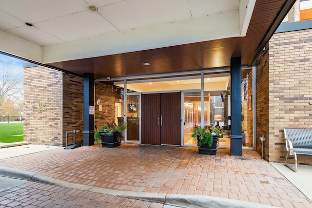 entrance to property with a patio