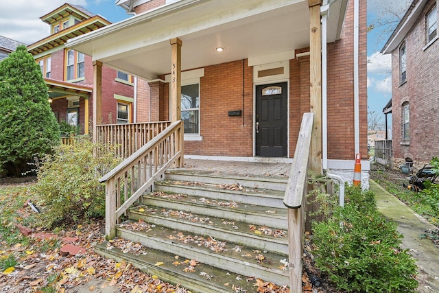 entrance to property with covered porch