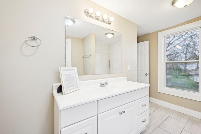 bathroom with tile patterned flooring and vanity