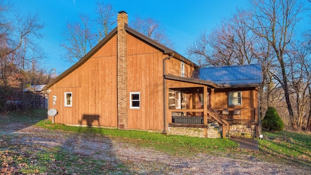 view of home's exterior featuring a porch