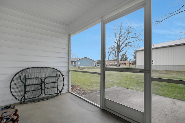 sunroom / solarium featuring a healthy amount of sunlight