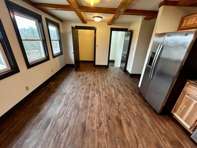 kitchen featuring stainless steel fridge, dark hardwood / wood-style flooring, and coffered ceiling