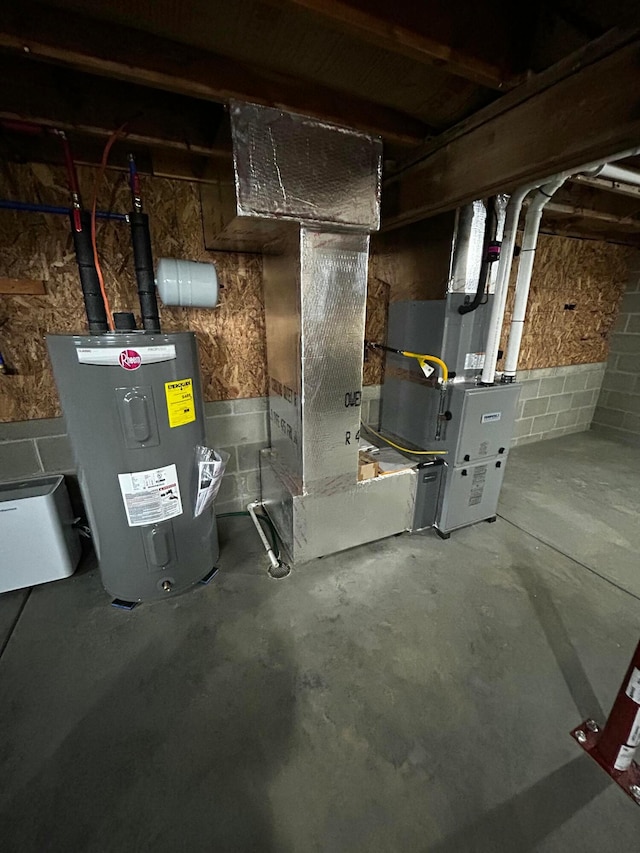 utility room featuring electric water heater